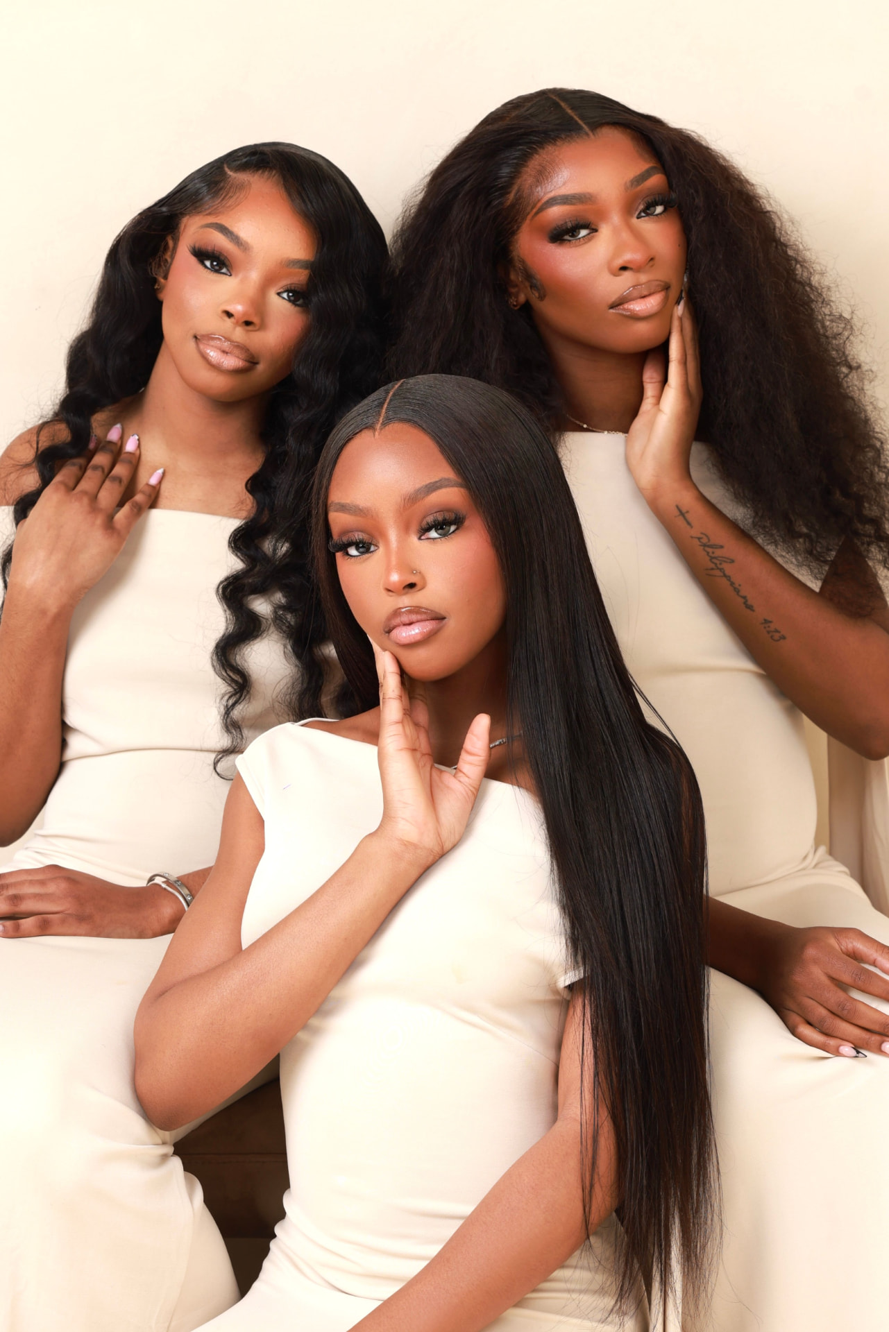 Three models wearing luxury TLuxe hair